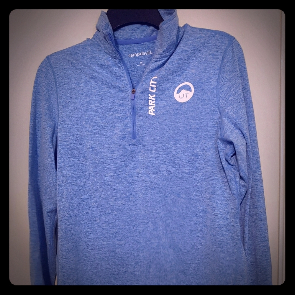 A light workout long sleeve w/ zip up neck